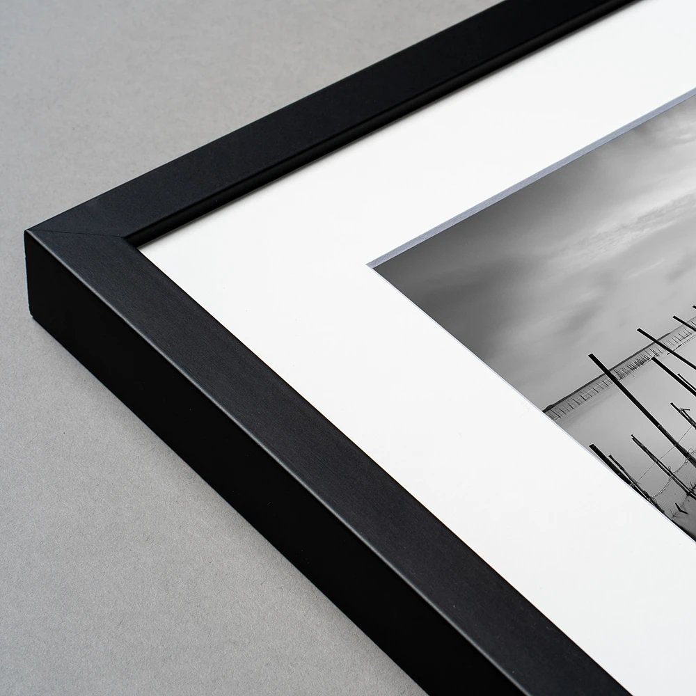 Close-up of a single mount around a framed portrait